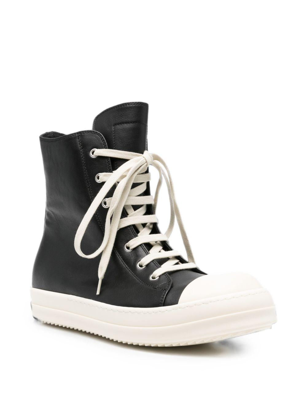 Sneakers alte in pelle in nero 