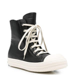 Sneakers alte in pelle in nero 