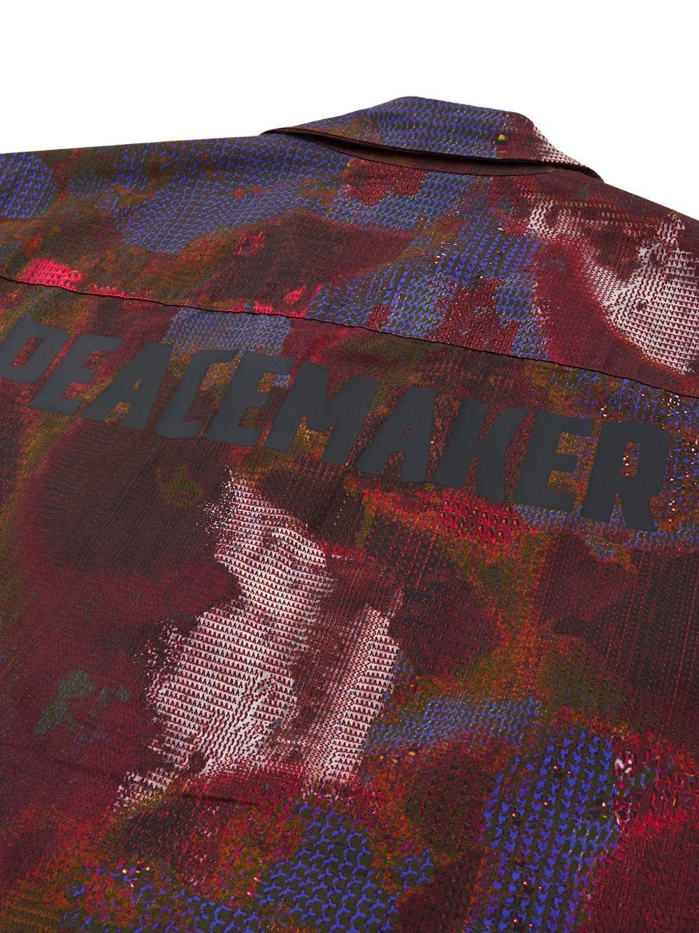 Camicia con stampa all-over in rosso e multicolore Oamc peacemaker - uomo 