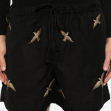 Pantaloncini con coulisse e ricamo di uccelli in nero Baziszt - uomo 