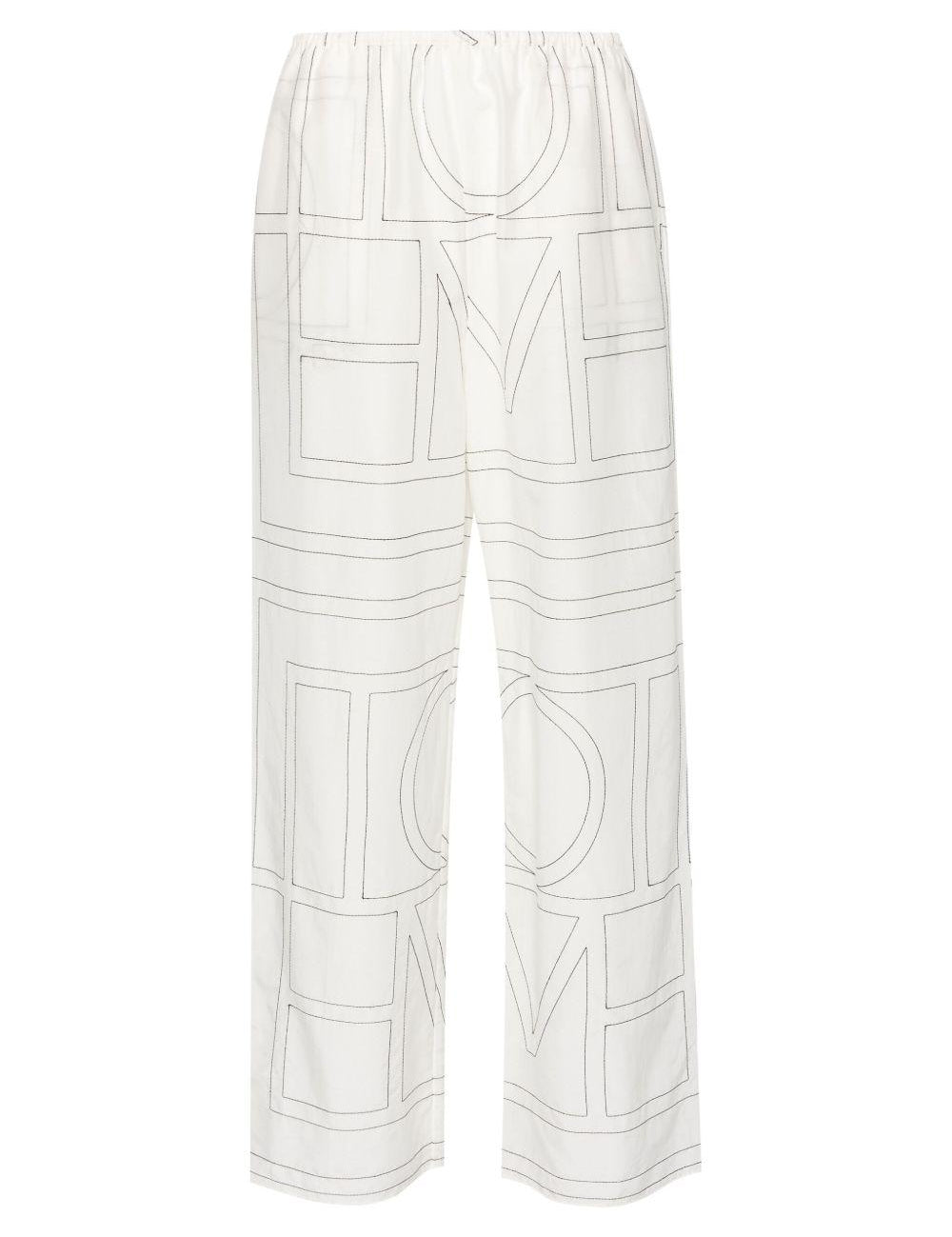 Pantaloni con monogramma ricamato in bianco Toteme - donna 