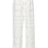 Pantaloni con monogramma ricamato in bianco Toteme - donna 