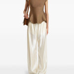 Top con orlo a peplum in marrone Khaite - donna 