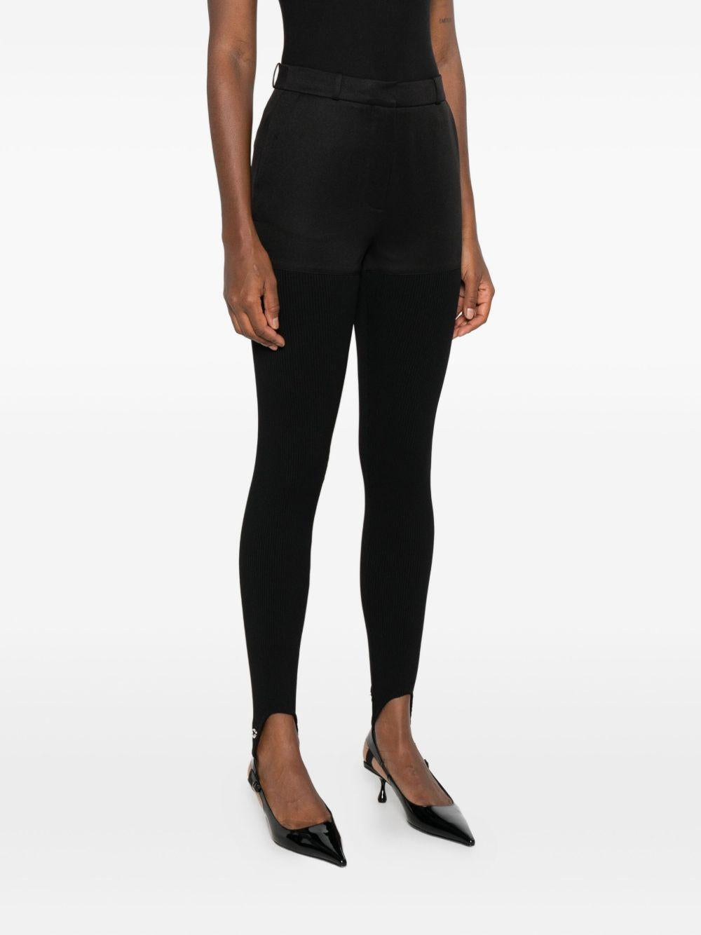 Leggings con staffe in nero Coperni - donna 