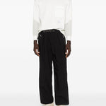 Pantaloni con tasche in nero and Wander - uomo 