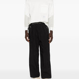 Pantaloni con tasche in nero and Wander - uomo 