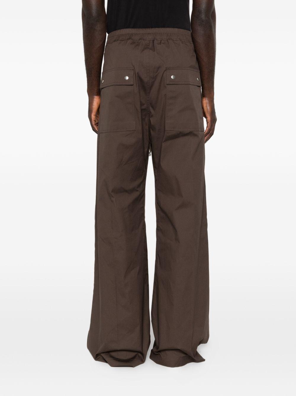 Pantaloni con dettaglio zip in grigio Rick owens - uomo 