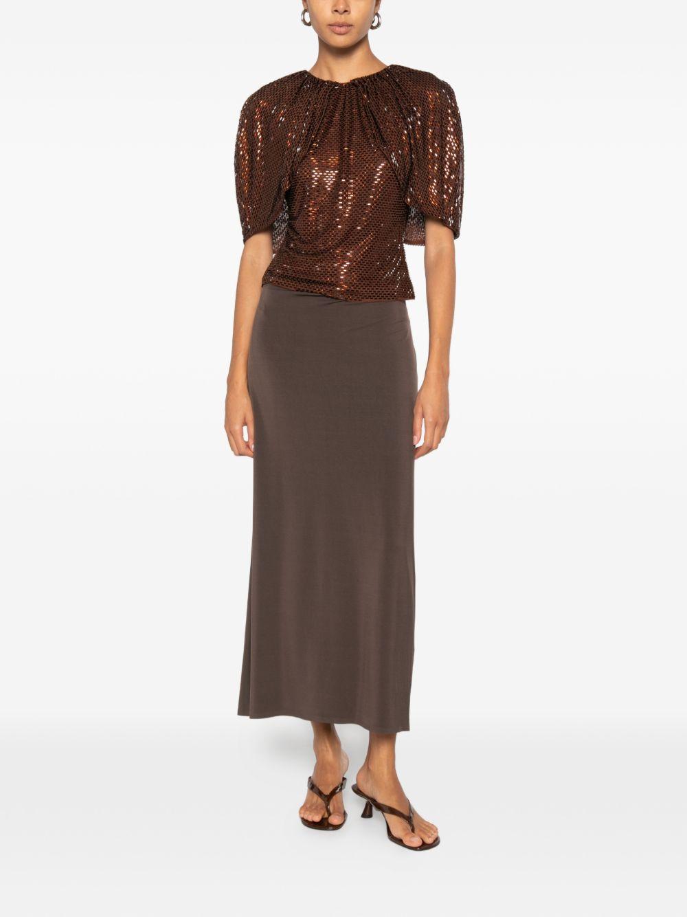 Top arricciato decorato con paillettes 