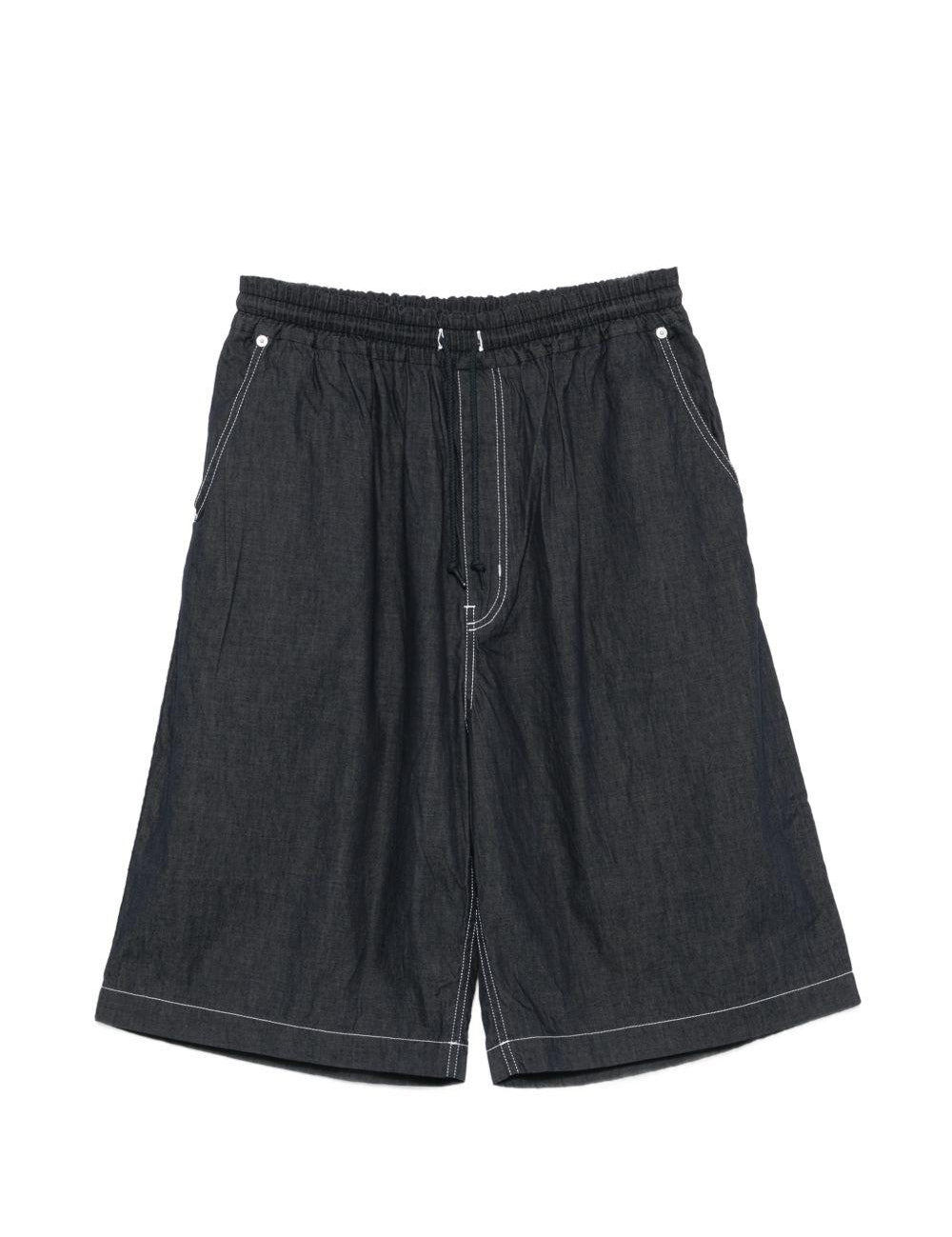Pantaloncini con cuciture a contrasto in blu Comme des garcons homme - uomo 