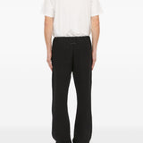 Pantaloni con applicazione in nero Mm6 maison margiela - uomo 