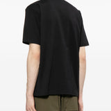 T-shirt con logo in nero Comme des garcons homme - uomo 
