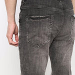 Jeans slim a vita bassa in grigio Purple - uomo 
