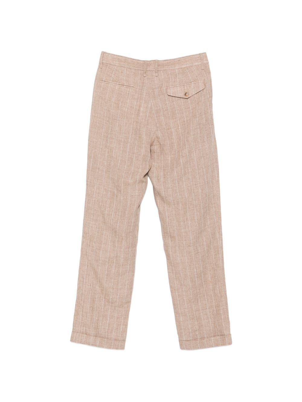 Pantaloni a righe in beige Simkhai - uomo 