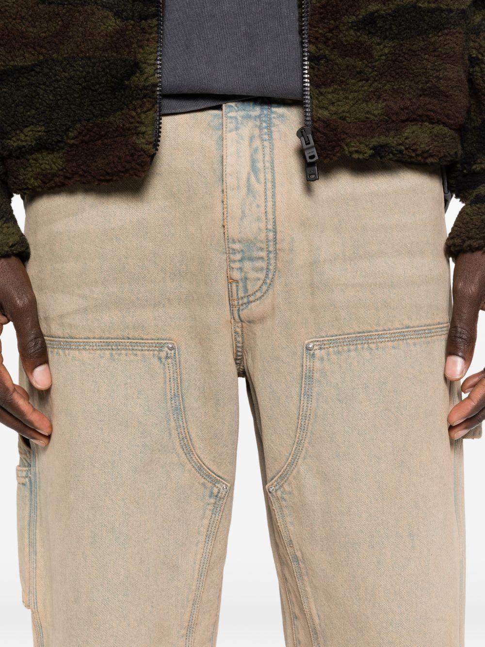 Jeans con tasche in beige Amiri - uomo 