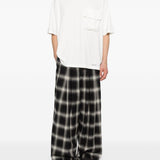 T-shirt con tasca sul petto in bianco Undercover - uomo 