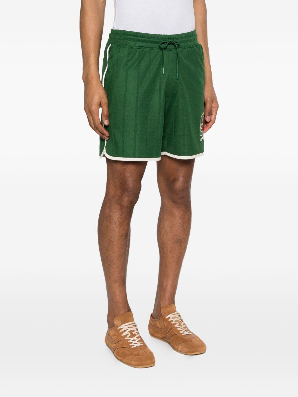 Shorts sportivi con logo in verde Drole de monsieur - uomo 