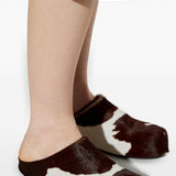 Mules fussbett con stampa mucca in bianco e marrone 