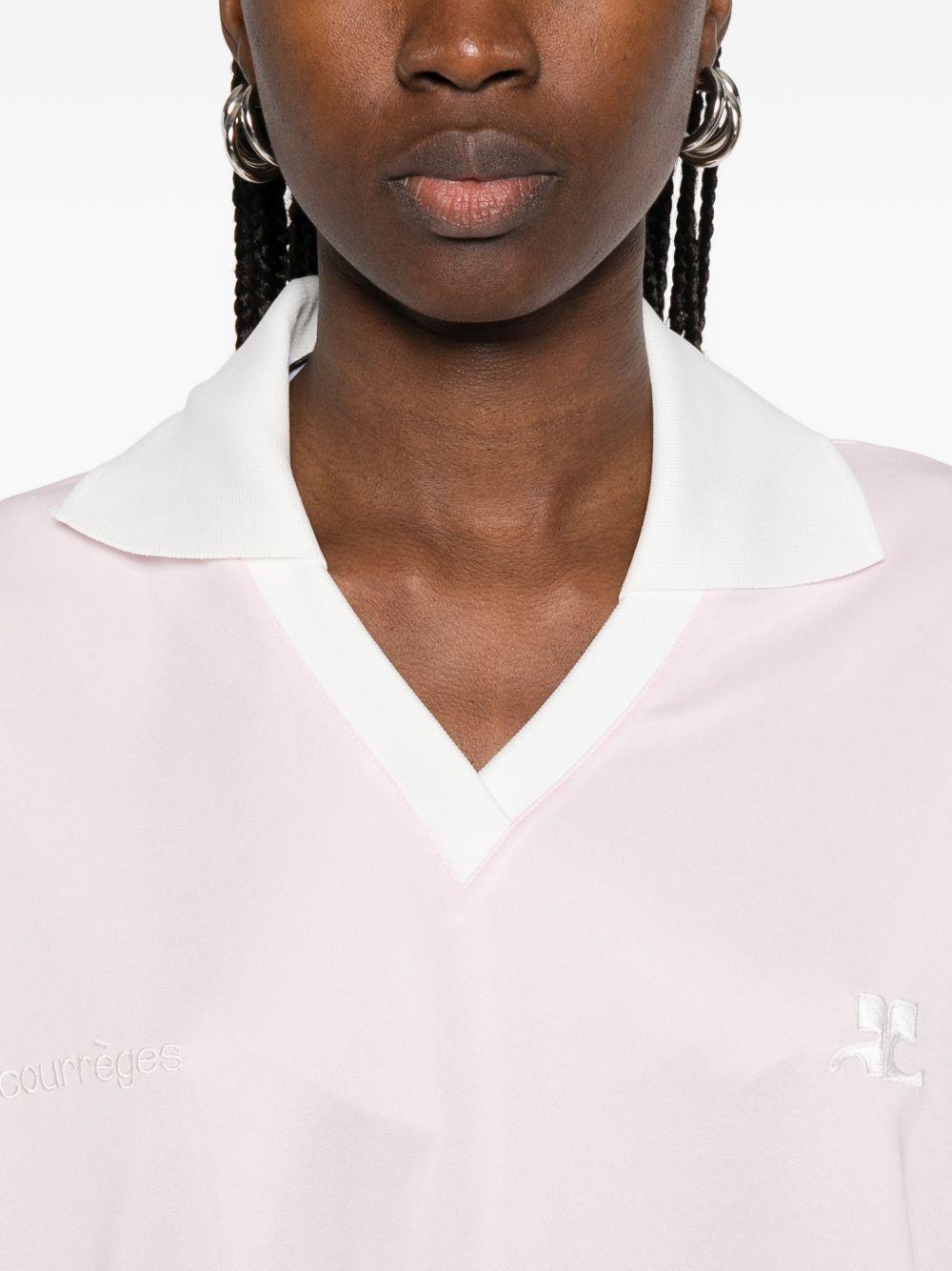Polo con logo e ricamo a v in bianco Courrèges - donna 