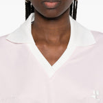 Polo con logo e ricamo a v in bianco Courrèges - donna 