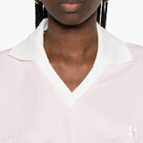 Polo con logo e ricamo a v in bianco Courrèges - donna 