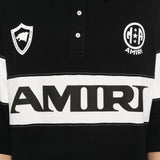 Polo con logo e dettagli a righe in nero e bianco Amiri - uomo 