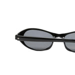 Occhiali da sole aria con montatura ovale in nero Chimi - unisex 