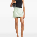 Minigonna Reedition con logo in verde Courrèges - donna 