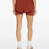 Shorts 2 in 1 con logo in rosso terracotta Adidas by Stella Mc Cartney - donna 