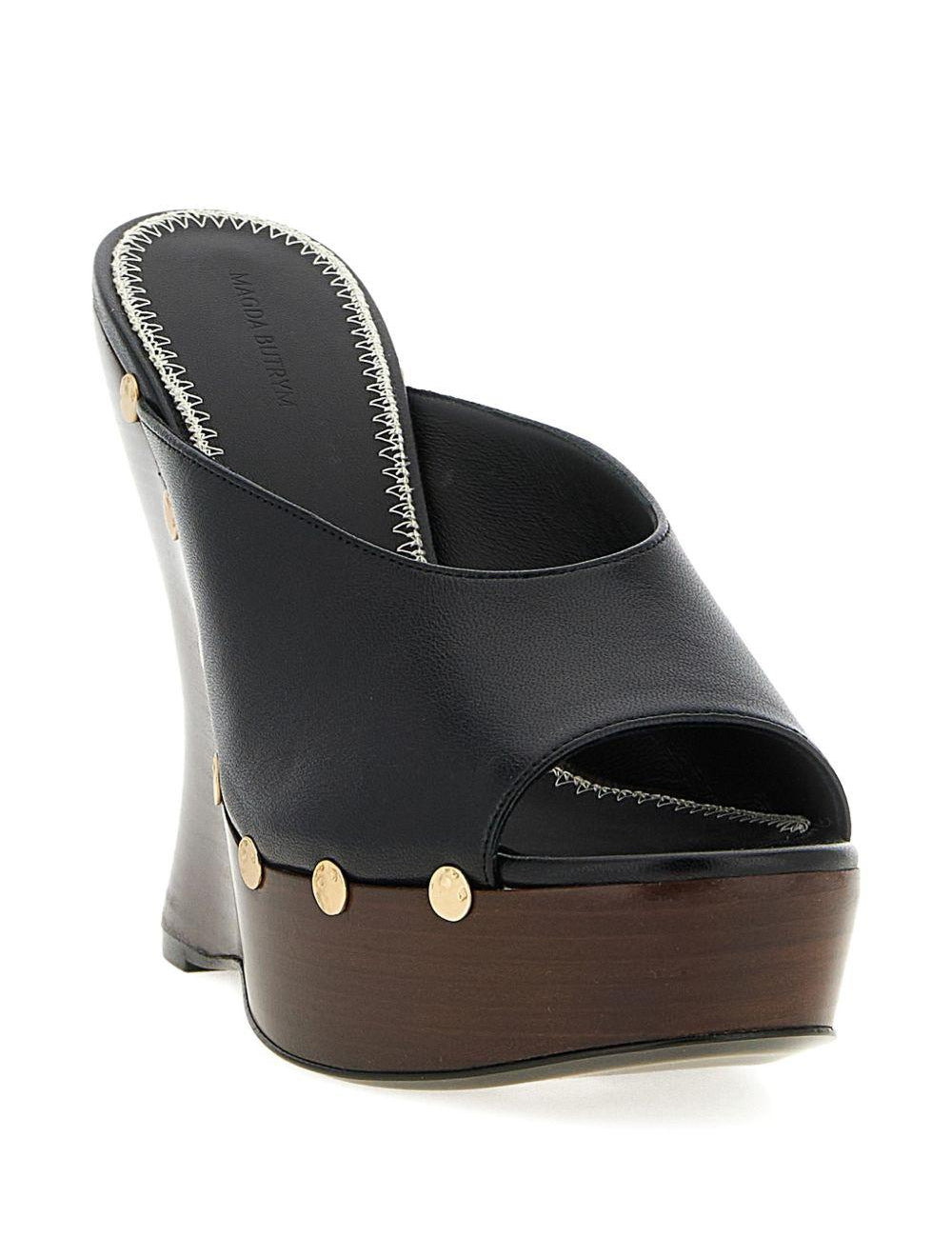 Mules in pelle con borchie e punta aperta in nero Magda butrym - donna 