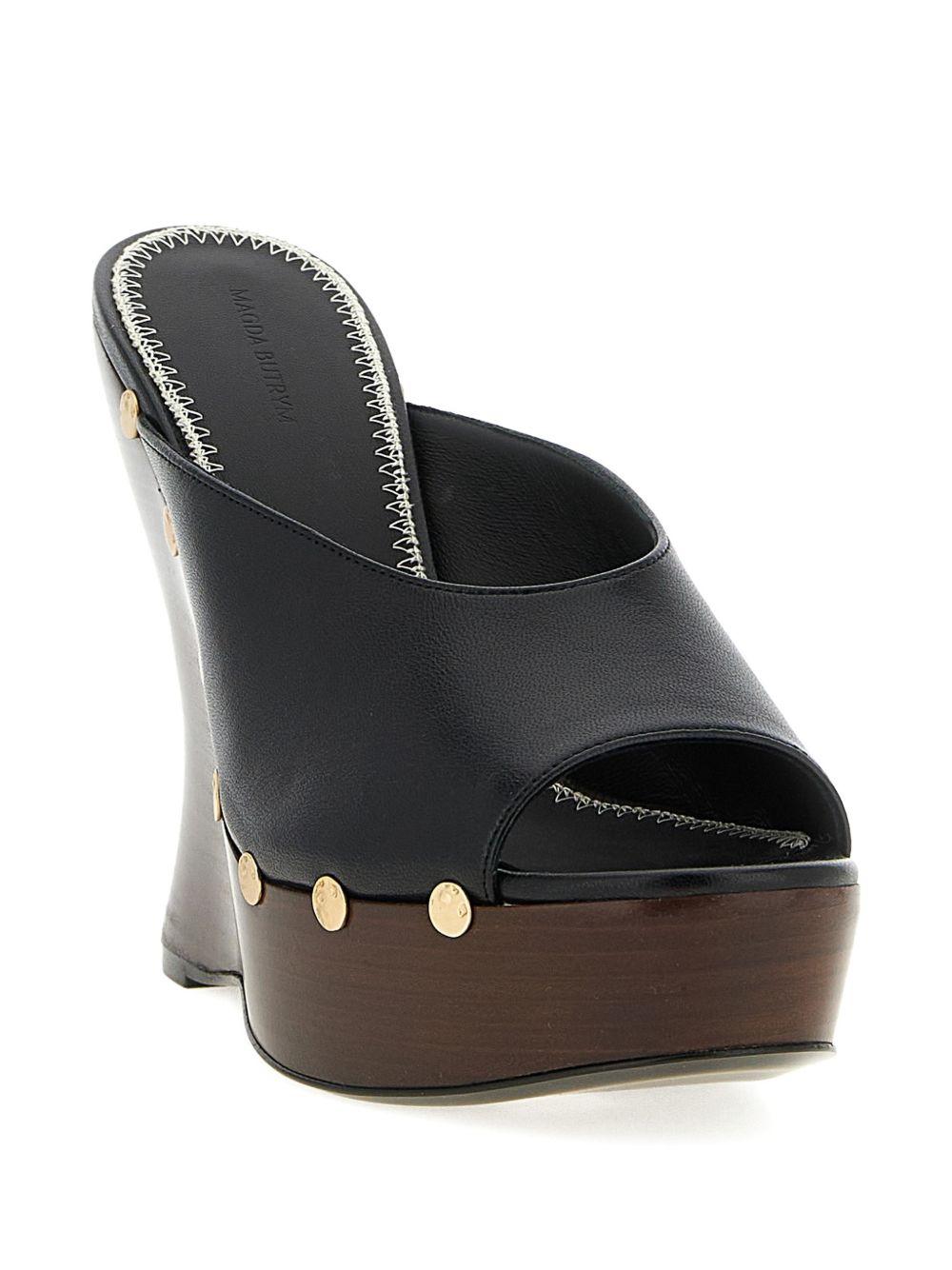 Mules in pelle con borchie e punta aperta in nero Magda butrym - donna 