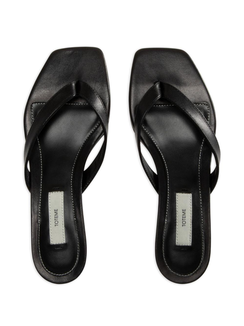 Sandali infradito in nappa in nero 