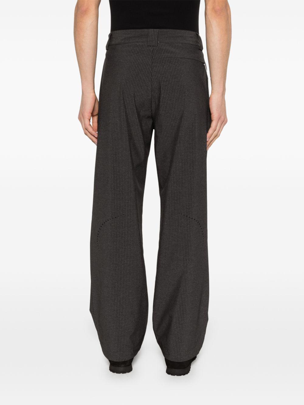 Pantaloni gessati con logo in nero Roa - uomo 