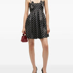 Abito mini a pois in nero Ganni - donna 