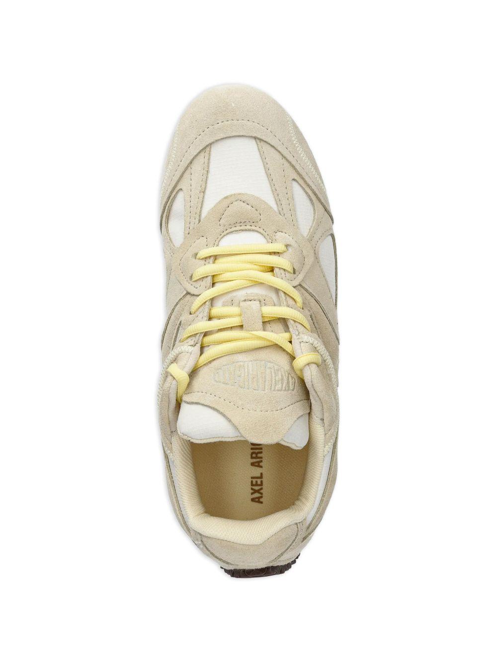Sneakers con logo e inserti in giallo Axel arigato - donna 