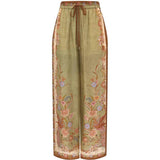 Pantaloni indra con stampa floreale in verde Zimmermann - donna 