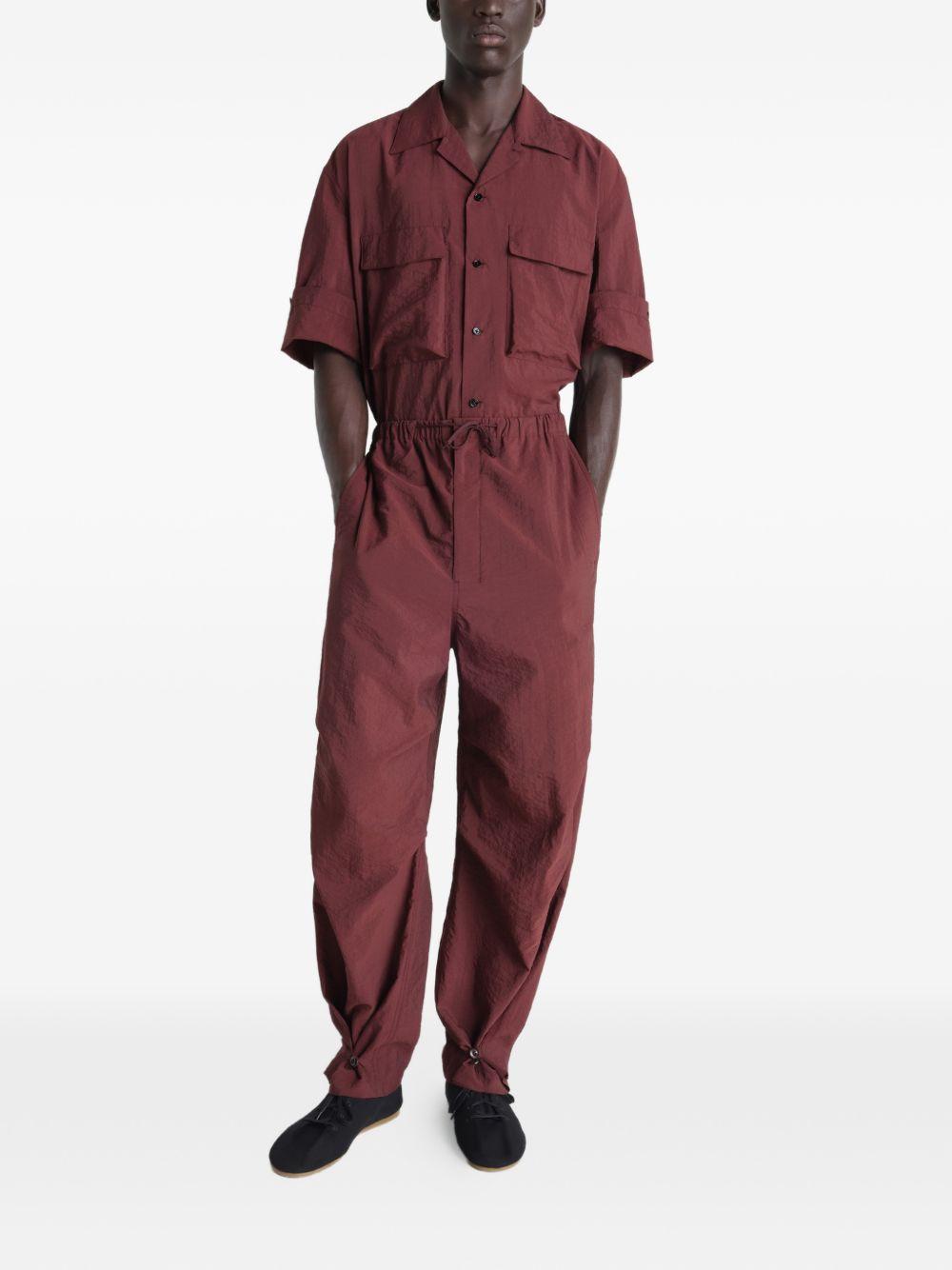 Pantaloni con pieghe in rosso Lemaire - uomo 