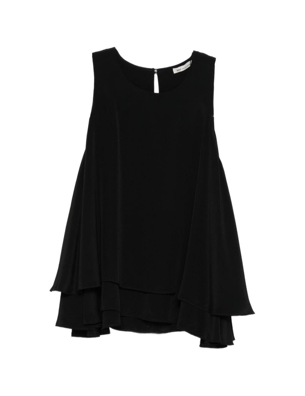Top con ruchesi in nero 