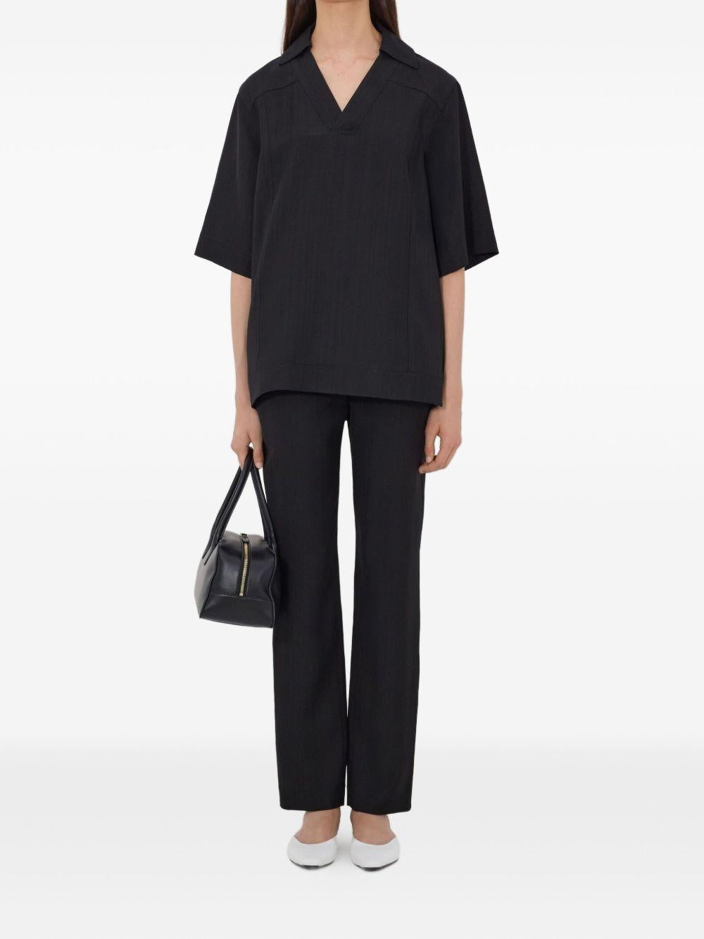 T-shirt con scollo a v ermo in nero Loulou de saison - donna 
