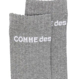 Calzini alti con logo in grigio Comme des garcons homme plus - uomo 