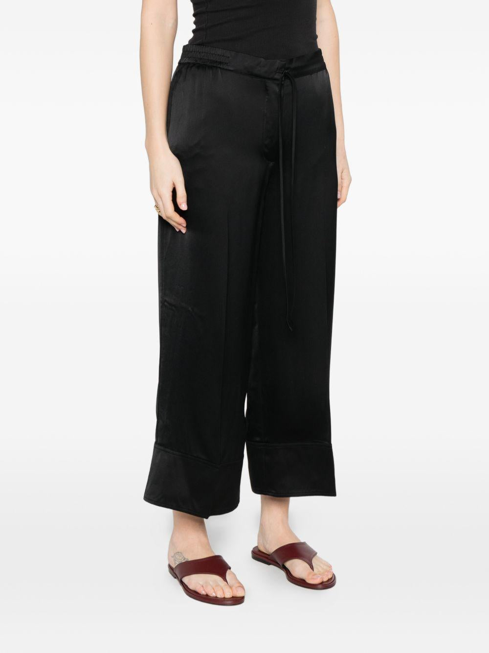 Pantaloni satinati con coulisse in nero Toteme - donna 
