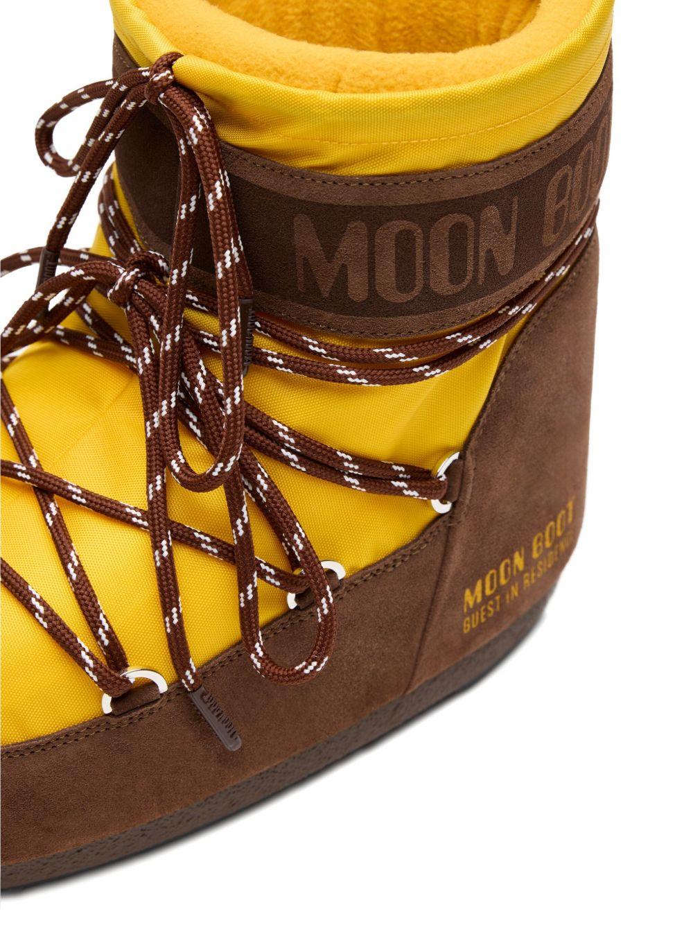 Stivali da neve con lacci e logo in giallo e marrone Moon boot x guest in residence - donna 