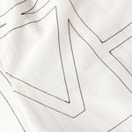 Pantaloni con monogramma ricamato in bianco Toteme - donna 
