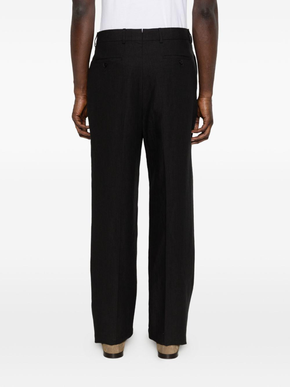 Pantaloni plissé  in nero Caruso - uomo 
