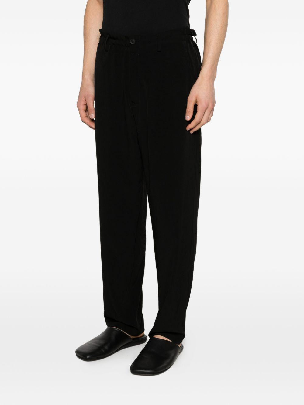 Pantaloni con bottoni in nero Yohji yamamoto - uomo 