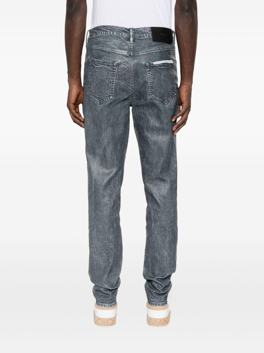 Jeans con lavaggio acido in blu Purple - uomo 