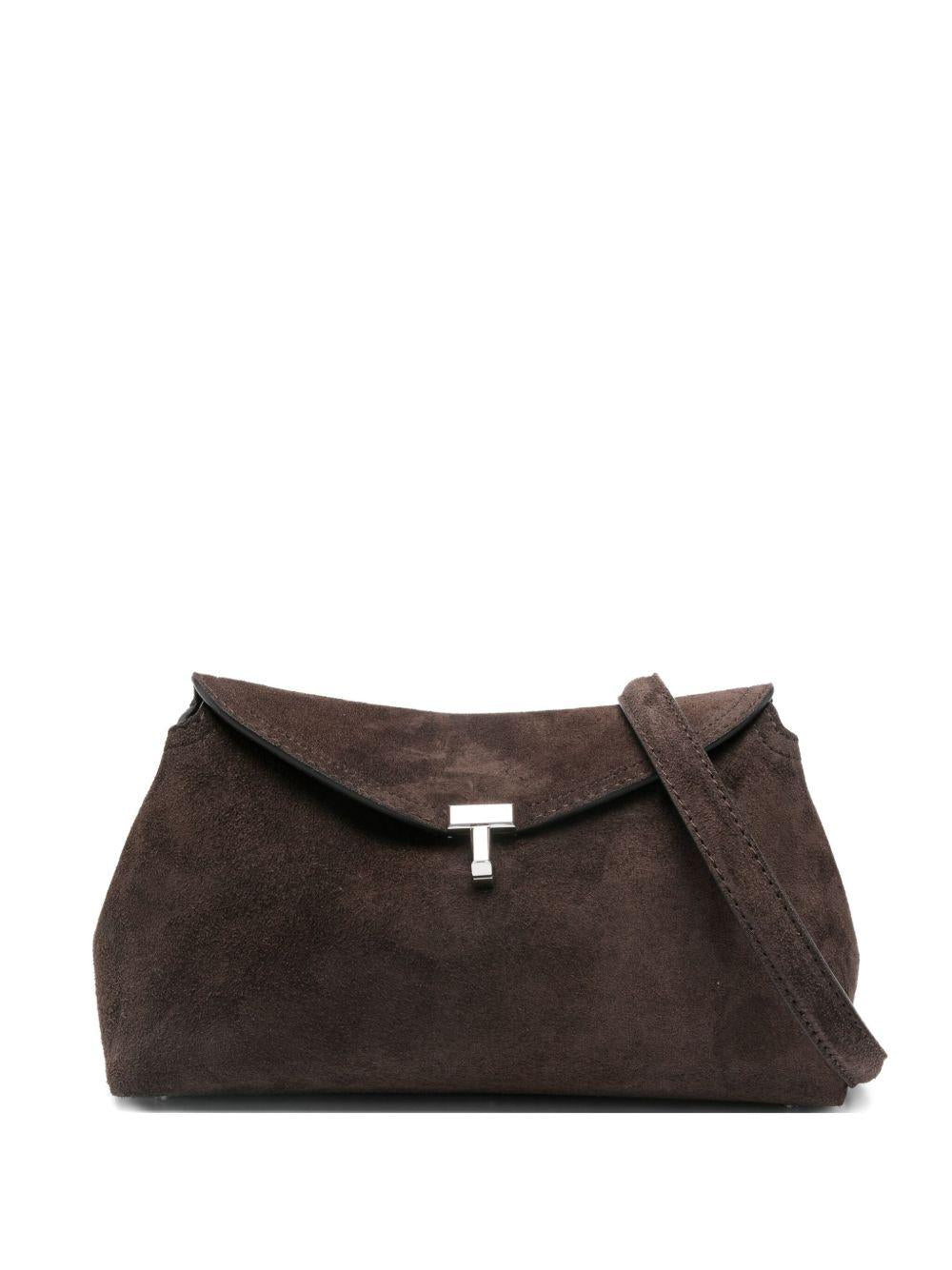 Clutch in suede con chiusura a T in marrone 