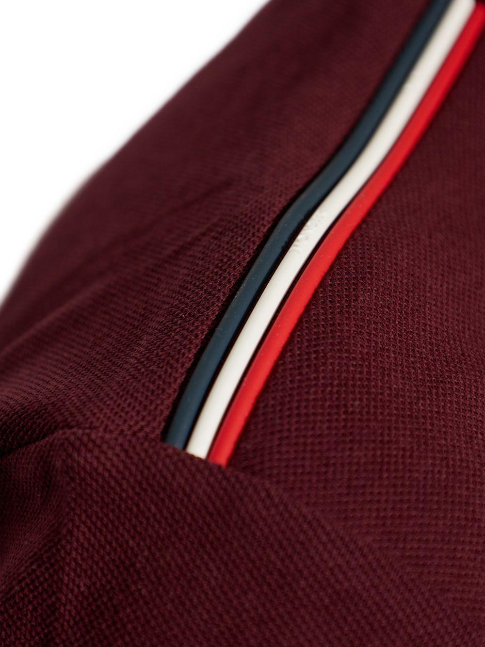Polo con dettaglio a righe in piquet in rosso Moncler - uomo 