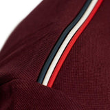Polo con dettaglio a righe in piquet in rosso Moncler - uomo 