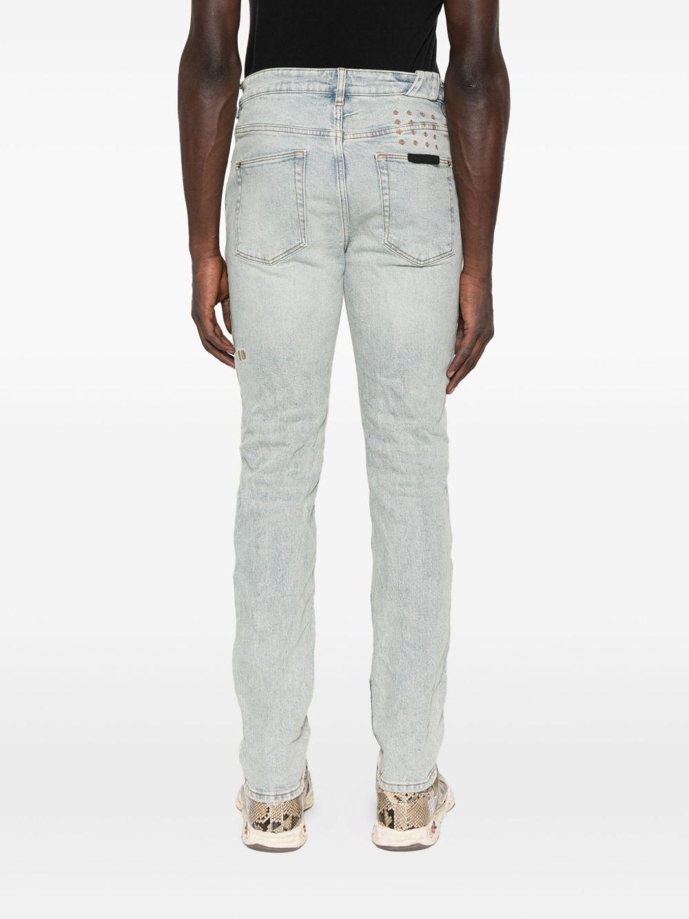 Jeans con dettagli effetto antiquato in blu Ksubi - uomo 
