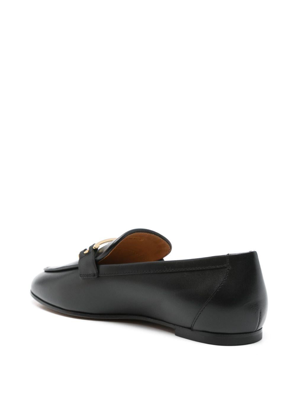 Mocassini in pelle con barra metallica in nero Tod's - donna 